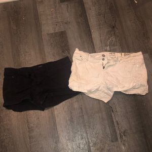 Black and white pairs of shorts